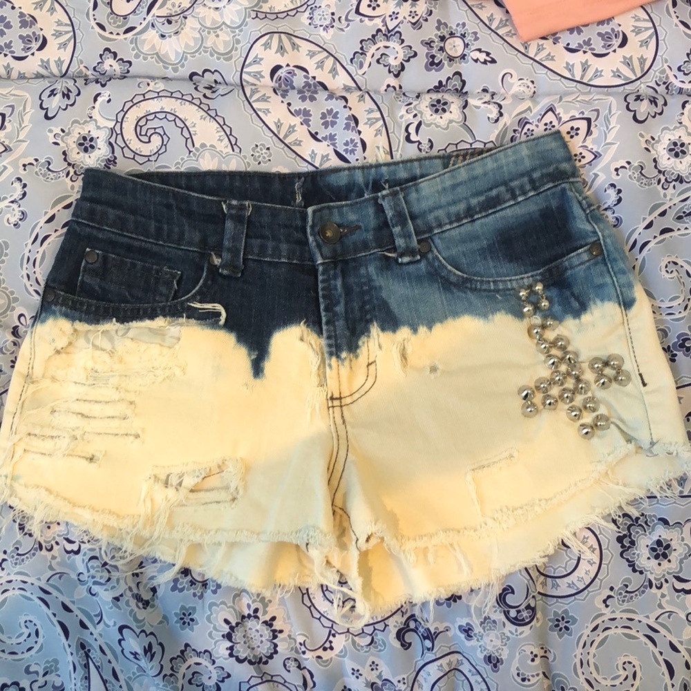 Distressed bleached denim shorts